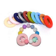 Bpa Free Custom Wholesale Food Grade Soft Baby Teething Toy Ring Teether Donut Silicone Beads